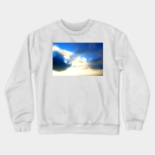 Blue sky covered with dark and light clouds Crewneck Sweatshirt